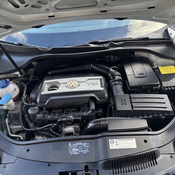 The Volkswagen engine bay after cleaning and conditioning at Blue Water Motorsports